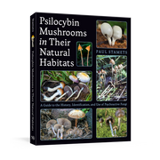 The book 'Psilocybin Mushrooms in Their Natural Habitats' by Paul Stamets, shown as a 3D mockup on a white background. The book cover is black with multiple color photographs of various mushrooms, and the spine is visible.